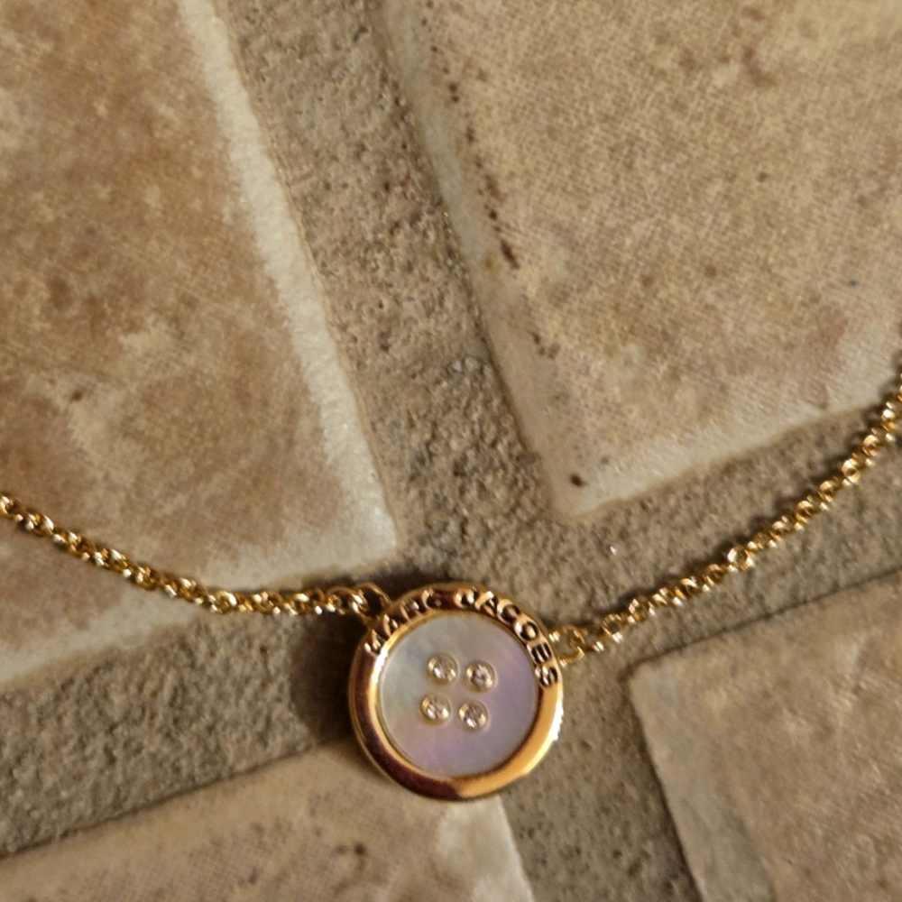 Brand New Marc Jacobs "The Button Pendant" necklace in yellow gold